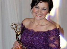 Janet Ivey getting an award